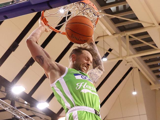 MELBOURNE, AUSTRALIA - JANUARY 18: Nathan Sobey of the Phoenix dunks during the round 17 NBL match between South East Melbourne Phoenix and New Zealand Breakers at State Basketball Centre, on January 18, 2025, in Melbourne, Australia. (Photo by Kelly Defina/Getty Images)