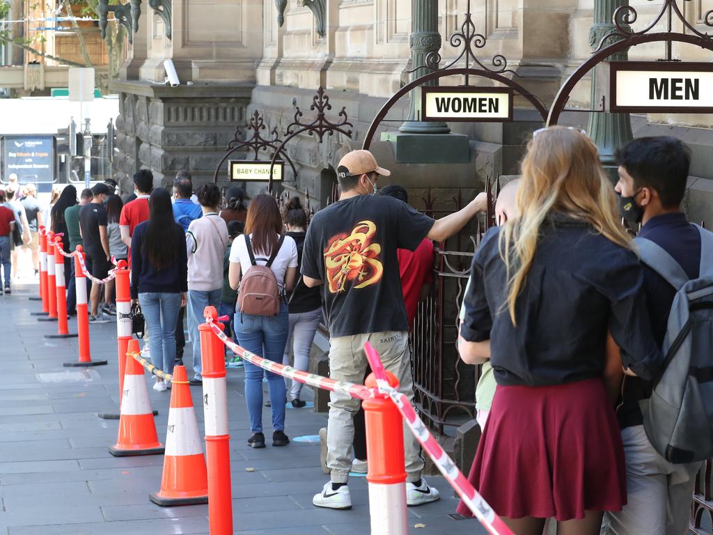 People line up at the Melbourne Town Hall for Covid testing as Covid numbers continue to grow in Victoria. Picture: NCA NewsWire/ David Crosling