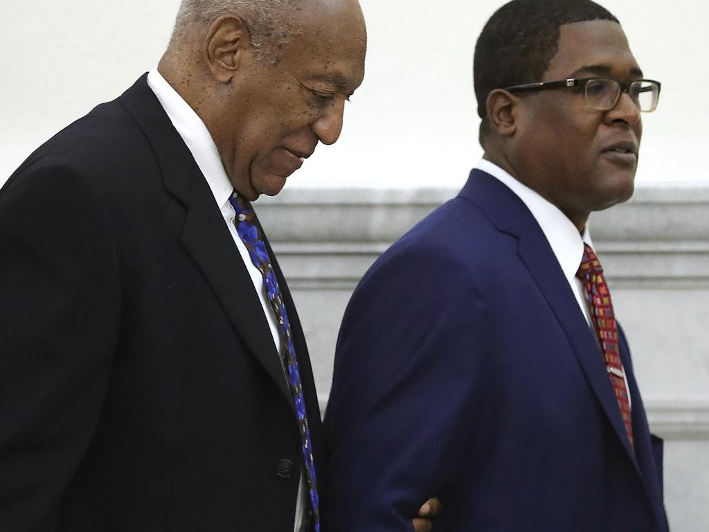 Cosby, pictured with his spokesman Andrew Wyatt, will spend three to ten years in prison. Picture: David Maialetti/The Philadelphia Inquirer via AP, Pool