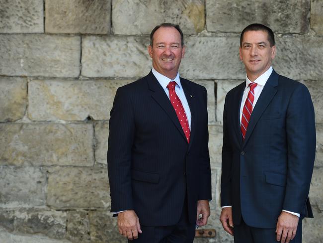 Whitehaven Chairman Mark Vaile (left) and CEO Paul Flynn (right) pose for a photograph during the Whitehaven Annual General Meeting in Sydney, Friday, Oct. 30, 2015. Whitehaven Coal aims to return to profitability this year by cutting costs further and targeting premium exports for its higher quality coal. (AAP Image/Dean Lewins) NO ARCHIVING