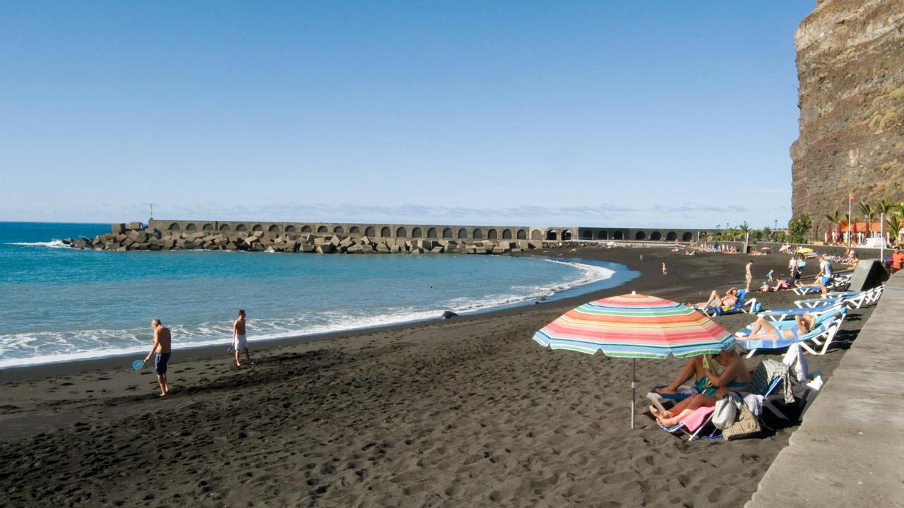 Black sand beaches offer a different experience. Picture: Alamy