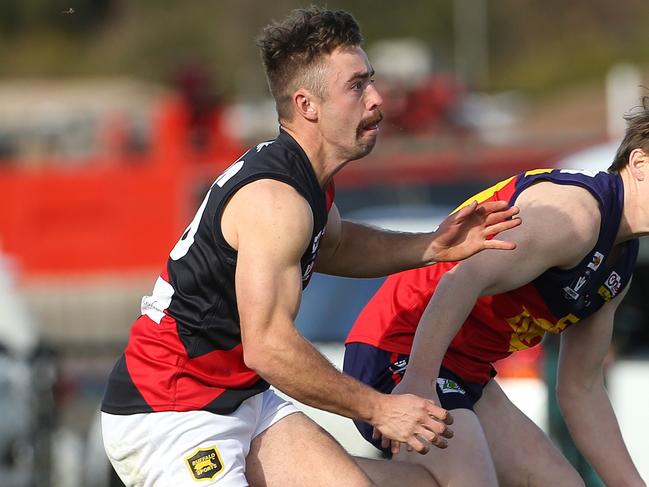 Joshua Wallace of Diggers Rest (right) contests with Jake Safstrom of Riddell during RDFL footy: Diggers Rest v Riddell on Saturday, July 6, 2019, in Diggers Rest, Victoria, Australia. Picture: Hamish Blair