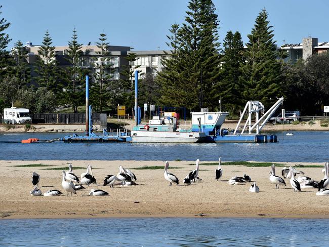 Dredge at work at The Entrance Channel. Picture: AAP / Troy Snook.