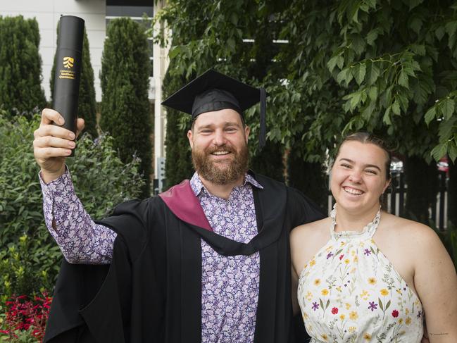 Diploma of Engineering Studies graduate Kieran Barber celebrates with Hannah Stock at a UniSQ graduation ceremony at Empire Theatres, Tuesday, February 13, 2024. Picture: Kevin Farmer