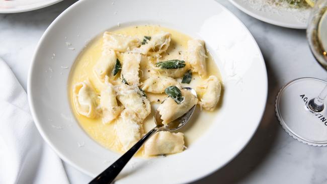 Tortelloni with mushrooms and butter sauce Maccheroni with tomato and vodka at Agostino wine bar.