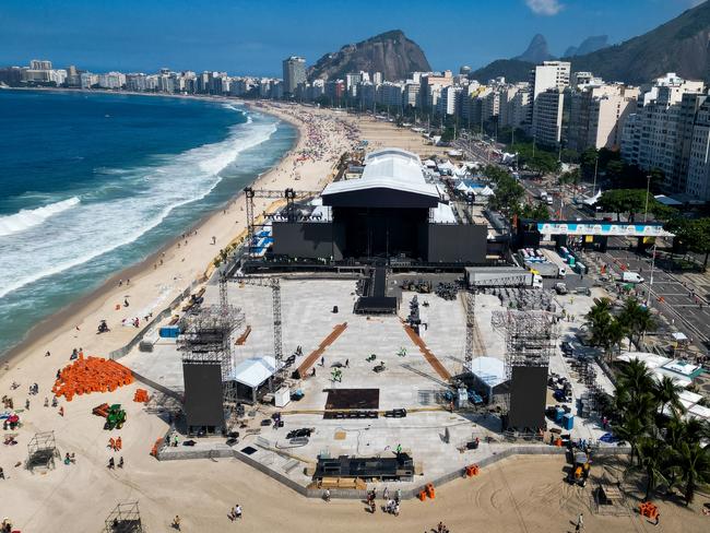 In an aerial view, builders work on dismantling the stage on the day after Lady Gaga's free show at Copacabana Beach. Picture: Getty Images