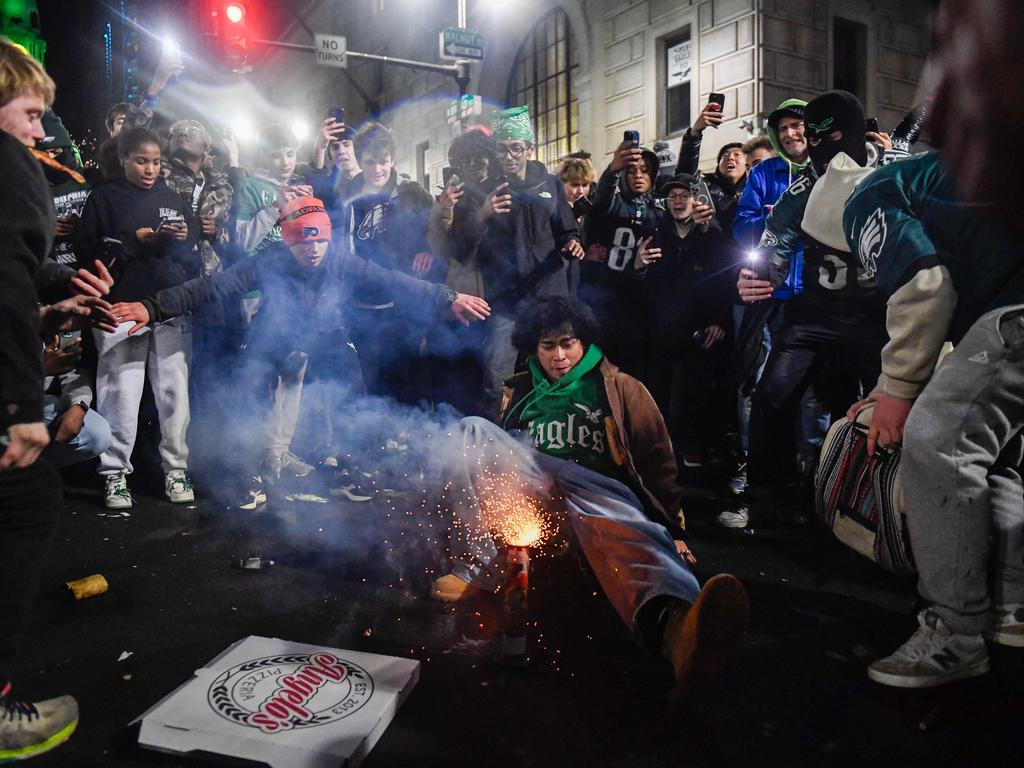 Philadelphia's Wild Celebration: Champagne, Fireworks, and Climbing Poles