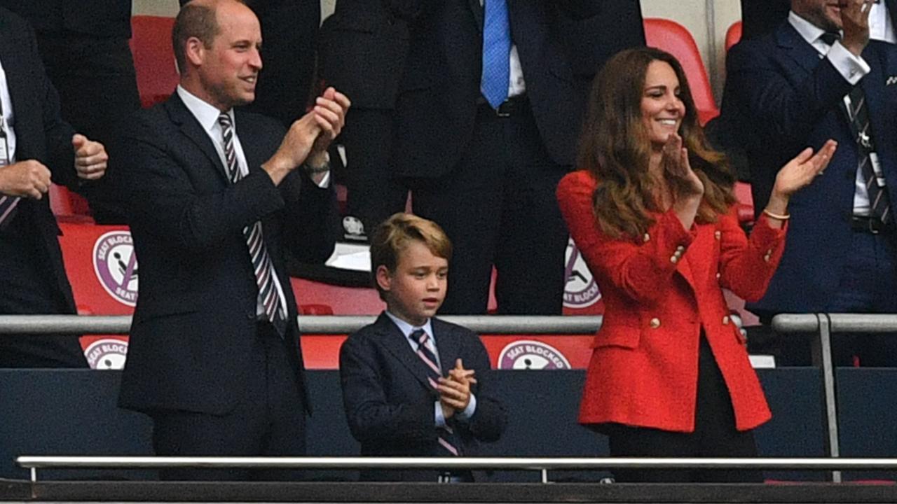 Prince William, Duke of Cambridge, Prince George of Cambridge, and Catherine, Duchess of Cambridge, celebrate the first goal in the UEFA EURO 2020 match. Picture: Justin Tallis/Pool/AFP