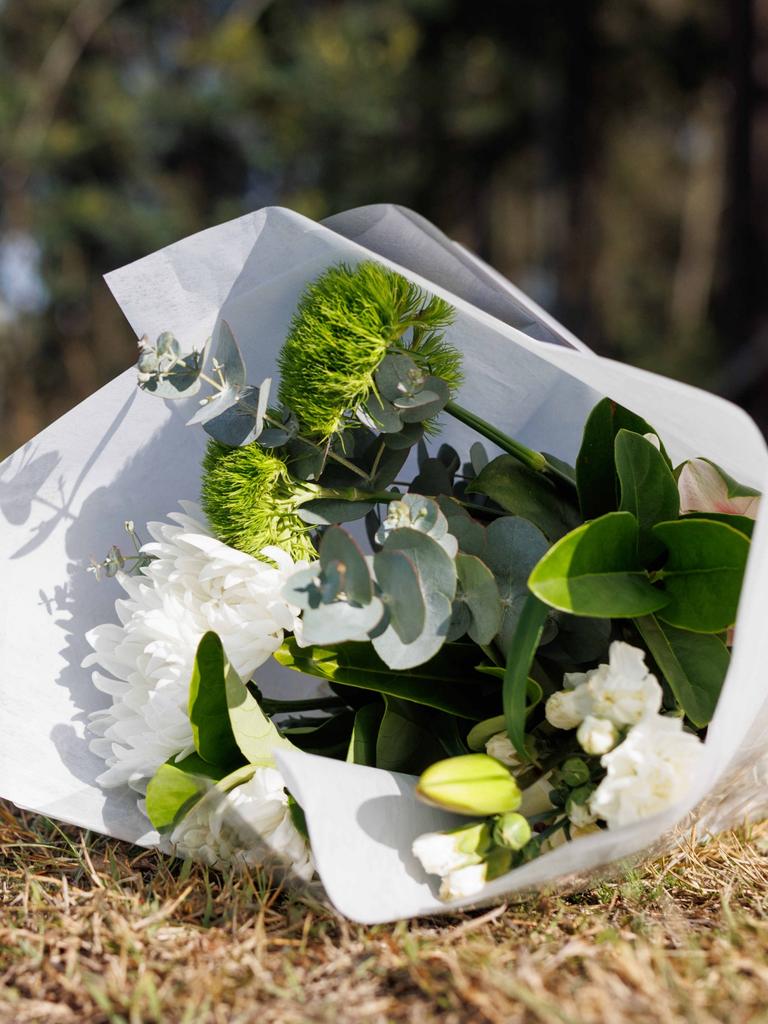 Flowers left at a tribute near the crash site. Picture: NCA NewsWire / David Swift