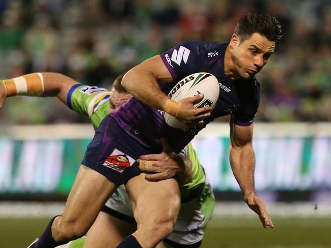 Cooper Cronk runs the ball against the Raiders. Picture Kym Smith