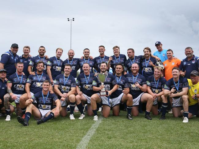 Newcastles celebrate win in Men's Country Championships grand final Riverina Bulls vs Newcastle Rebels at Woy Woy Oval Saturday 25th March 2023