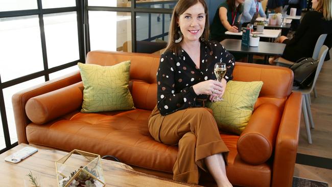 Courier Mail journalist Kylie Lang posing at the opening of My Lounge by Virgin Australia at Brisbane International Airport on Wednesday, September 4, 2019. (AAP Image/Claudia Baxter)