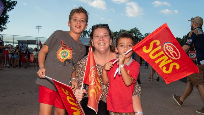 Haris (8), Imran (4) and Josephine Syed at the 2024 AFL match between Gold Coast Suns and North Melbourne at TIO Stadium. Picture: Pema Tamang Pakhrin