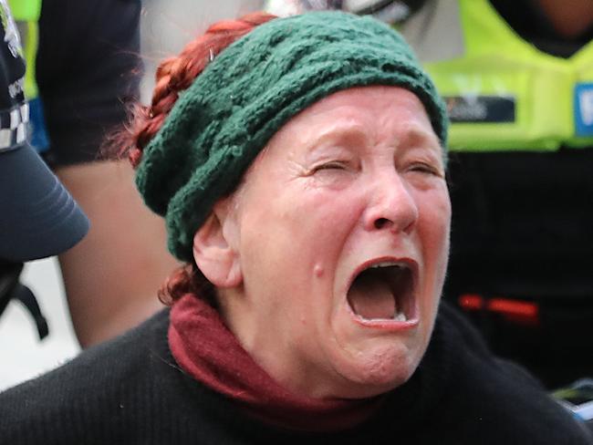 "Millions March against mandatory Covid vaccinations" Rally organised by a group dubbed "Health Rights Alliance" in Flagstaff Gardens Melbourne. Police arrest a woman at Flinders st station after she allegedly tried to bite an officer. Picture: Alex Coppel.