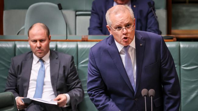 Prime Minister Scott Morrison speaks as Treasurer Josh Frydenberg looks on during Question Time in the House of Representatives at Parliament House on September 3. Picture: David Gray/Getty Images