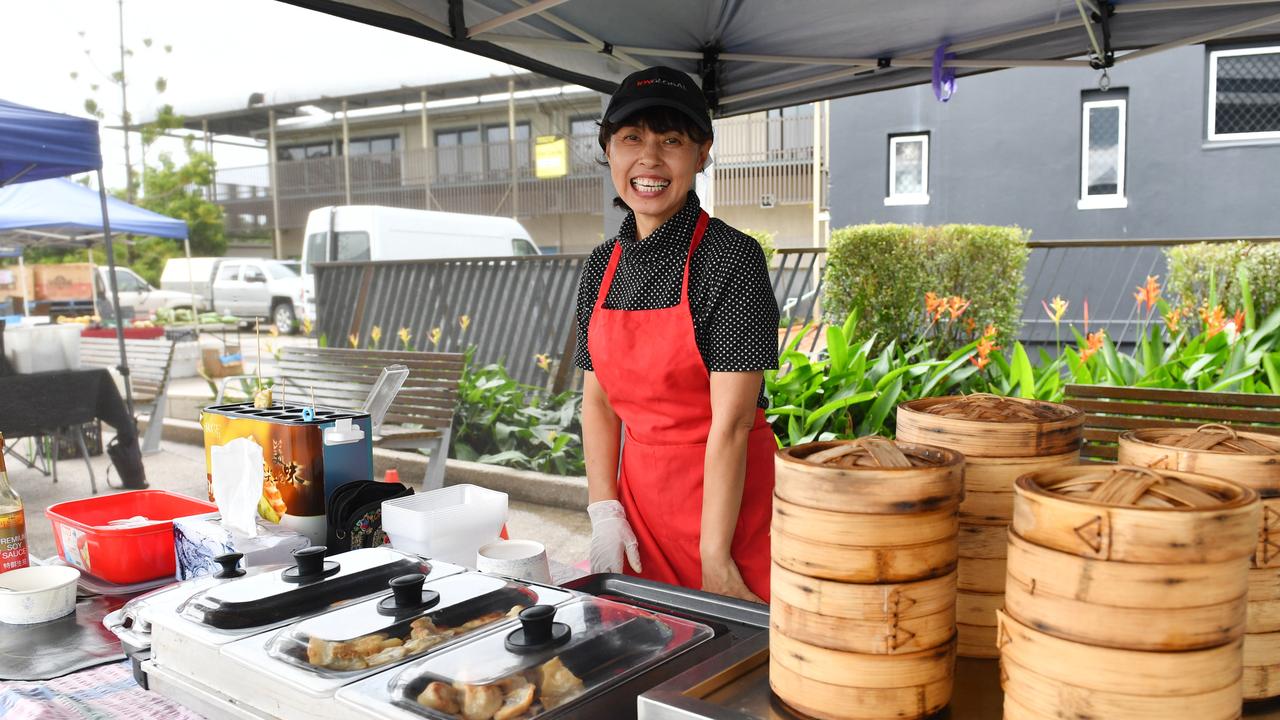 Amanda Liu cooks dumplings at the Greater Whitsunday Farmers Market. Picture: Tony Martin