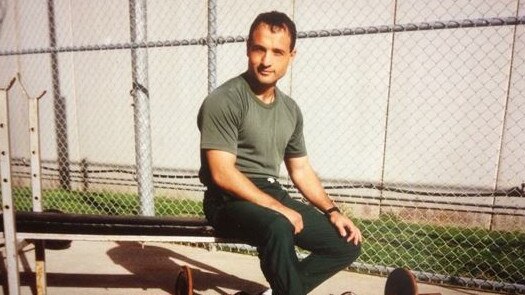 Kings Cross enforcer and commando now turned author Jim Taousanis in a prison yard in 1996. Picture: Supplied