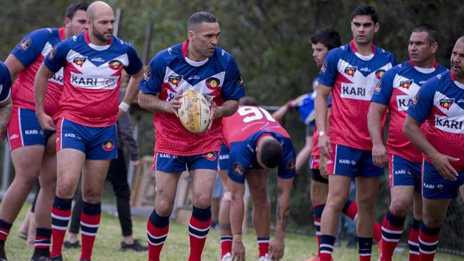 Anthony Mundine warms up with Nanima ahead of their clash with Redfern All Blacks. Picture: Jenny Evans