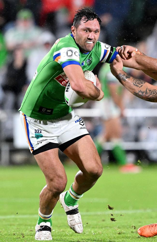 Jordan Rapana of the Raiders breaks away from the defence of Ray Stone of the Dolphins during the round 13 NRL match between Dolphins and Canberra Raiders at Suncorp Stadium, on June 01, 2024, in Brisbane, Australia. (Photo by Bradley Kanaris/Getty Images)