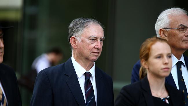 Michael Ambrose Endicott (middle, grey hair) pictured leaving the Supreme Court, Brisbane Monday 4th March 2019 Picture: AAP