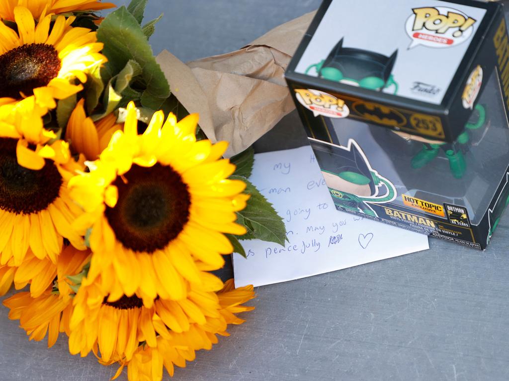 Fans have left loving tributes and gifts outside his home. Picture: Michael Tran/AFP