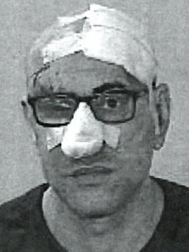 Zahed’s mugshot, taken while he was recovering from injuries sustained in a shooting at an Auburn gym that killed his brother Omar.