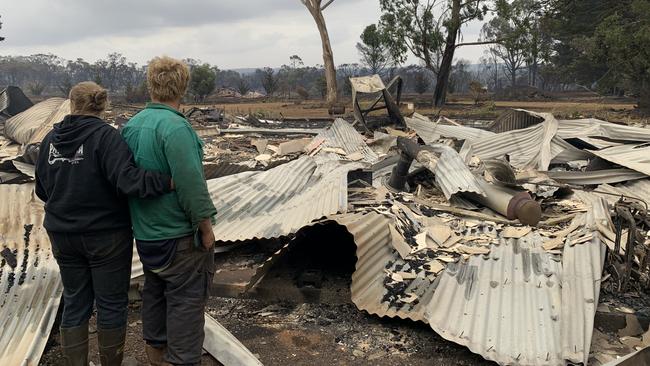 Danielle and Sam Short, check out the remains of their former home. Pictures: Danielle Short