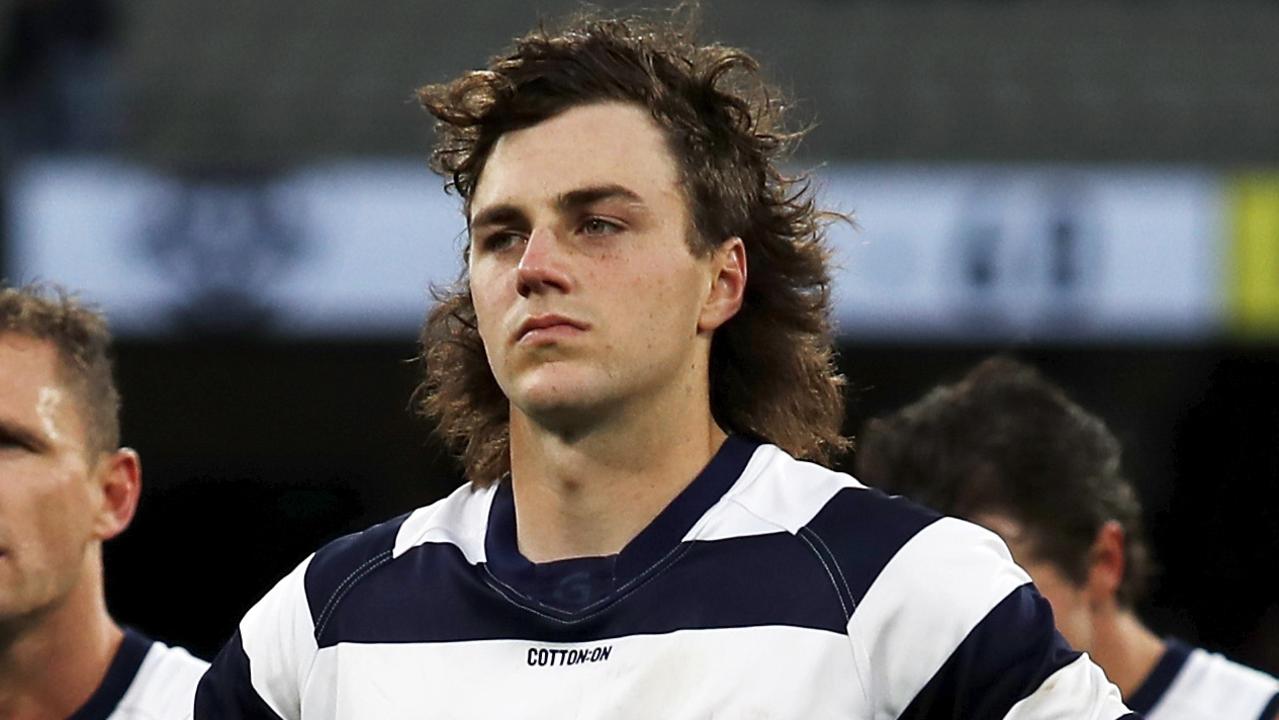 MELBOURNE, AUSTRALIA - APRIL 11: Jordan Clark of the Cats reacts after a loss during the 2021 AFL Round 04 match between the Melbourne Demons and the Geelong Cats at the Melbourne Cricket Ground on April 11, 2021 in Melbourne, Australia. (Photo by Dylan Burns/AFL Photos via Getty Images)