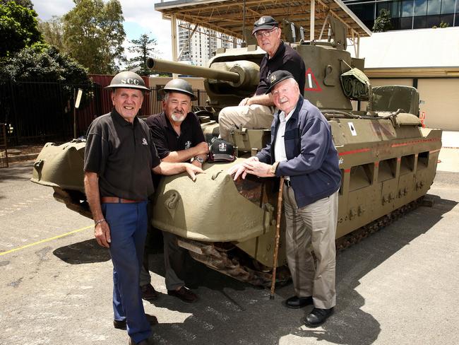 George Glass, Len Koles and Mike McGraw, Colonel JB Arnott, (a former Matilda tank crewmen) are all part of the restoration team at the NSW Lancers Memorial Museum in Parramatta Picture: Justin Sanson