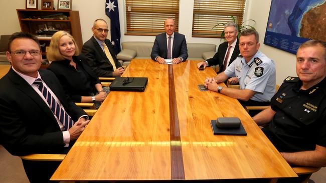 Peter Dutton and his agency heads meet at Parliament House, Canberra. From left: Michael Phelan, CEO Aust.Criminal Intelligence Commission; Nicole Rose, CEO Aust. Transaction Reports and Analysis Centre; Michael Pezzullo, Secretary Dept. Home Affairs; Minister Dutton; Duncan Lewis, Director-General ASIO; Andrew Colvin, Commissioner AFP; Michael Outram, A/G Australian Border Force Commissioner.