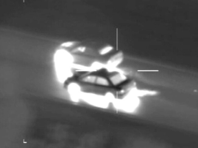 Police have released harrowing Air Wing footage of a car being hit from behind as two hoons race down Mickleham Rd in Melbourne's northwest in 2016. Picture: Victoria Police