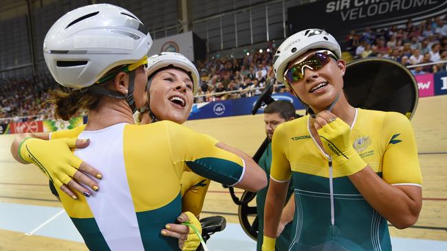 Annette Edmondson celebrates with Amy Cure and Melissa Hoskins (right) after winning gold during the women's 10km scratch race at the 2014 Commonwealth Games in Glasgow.