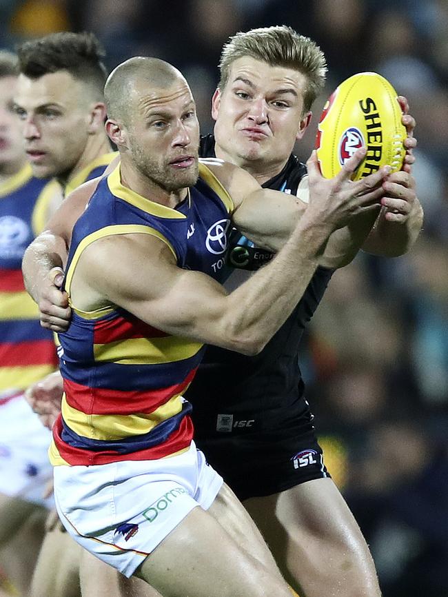 Scott Thompson grapples with Port’s Ollie WInes during Showdown 41. Picture Sarah Reed