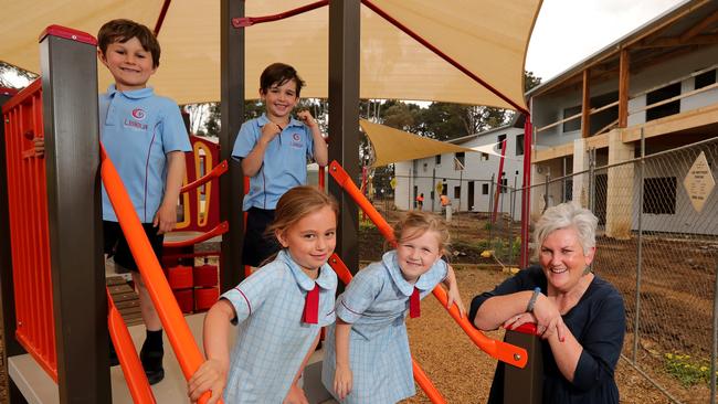 ‘A really vibrant community’: Lisieux Catholic Primary School principal Susan Ryan with pupils Zander, Louie, Indie and Mira. Picture: Stuart McEvoy