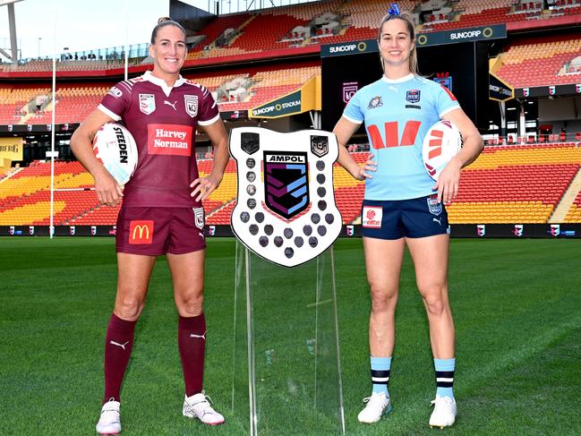 Ali Brigginshaw of Queensland and Kezie Apps of New South Wales with the women’s Ampol State of Origin shield at Suncorp Stadium. Picture: Bradley Kanaris/Getty Images