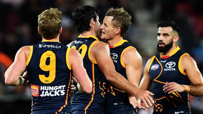 ADELAIDE, AUSTRALIA - APRIL 13:Darcy Fogarty of the Crows celebrates a goal with Jordan Dawson of the Crows  during the round five AFL match between Adelaide Crows and Carlton Blues at Adelaide Oval, on April 13, 2023, in Adelaide, Australia. (Photo by Mark Brake/Getty Images)