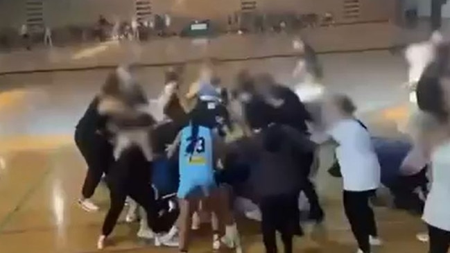 Parents and teens descended on the court at the under-16s girls’ game. Picture: 9News