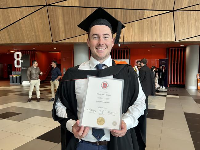 Charlie Douglas graduates with a Bachelor of Occupational Therapy from the Australian Catholic University on April 17, 2024. Picture: Brittany Busch