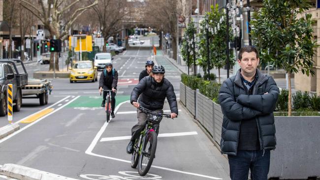 Car lanes have been removed to make way for bike lanes along Exhibition Street making parking and impacting shops. Picture: Jason Edwards