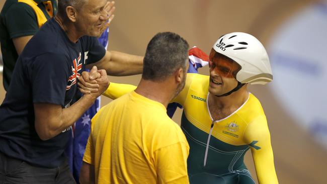 Bobridge is congratulated by his support team.