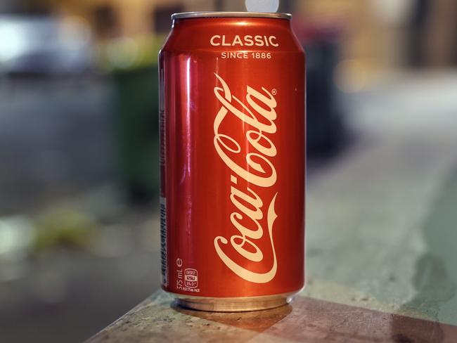 Pictured a can of Coca Cola at Kings Cross in Sydney.Picture: Richard Dobson