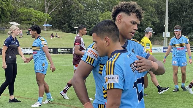 Norths try scoring hero Jordan Kake, left, is congratulated.