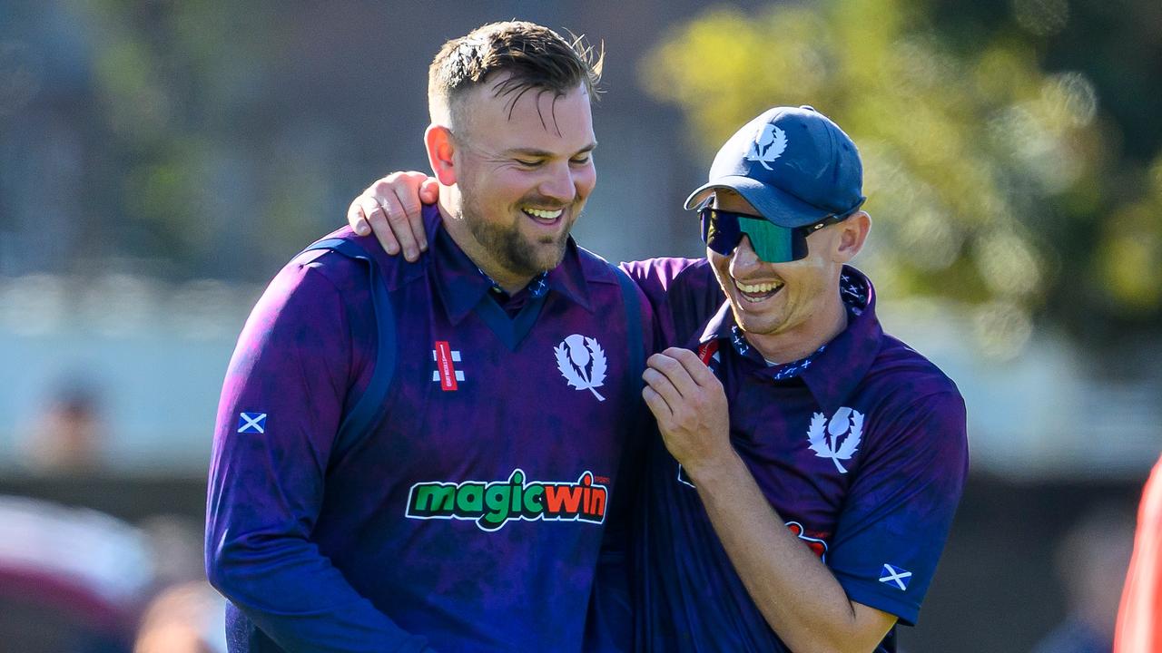 Scotland's Mark Watt is congratulated by Branden McMullen. Photo by Malcolm Mackenzie/PA Images via Getty Images