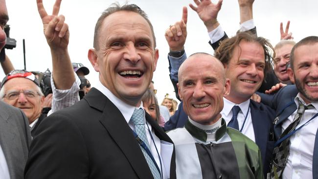 Trainer Chris Waller and jockey Glen Boss celebrate Yes Yes Yes’ win in The Everest. Picture: AAP