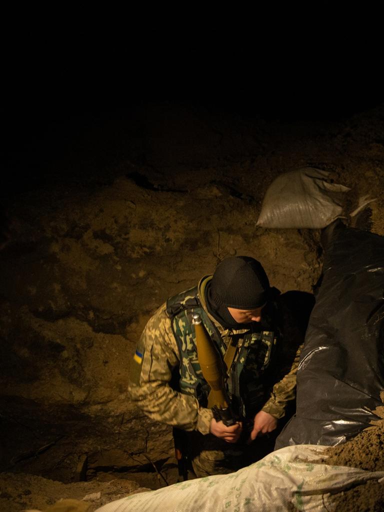 A member of the 127th Territorial Defense Force brigade prepares an RPG in a trench on a road on the outskirts of Kharkiv. Picture: Getty Images.