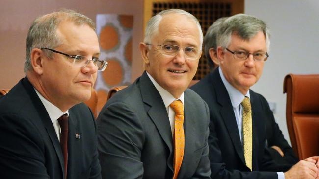 PM Malcolm Turnbull, flanked by Treasurer Scott Morrison and PM&C Secretary Dr Martin Parkinson, addresses State and Territory leaders, Treasurers and staff in the Cabinet Room of Parliament House, Canberra, at the start of today's COAG meeting.