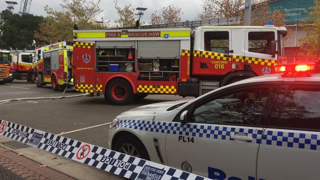 NSW Fires and Rescue crews were called to Showground Road near Grand Parade about 2.30pm after a large fire broke out in a building with huge plumes of dark smoke billowing across the city's west. Picture: AAP Image/Georgie Moore.