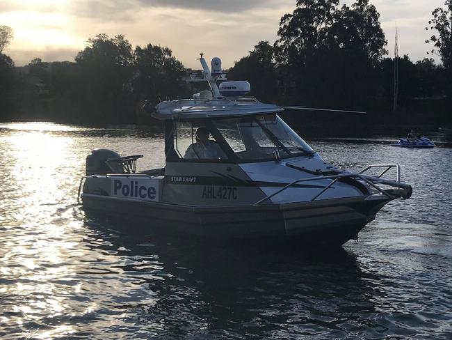 A police boat searched the river for the girl’s severed limb.