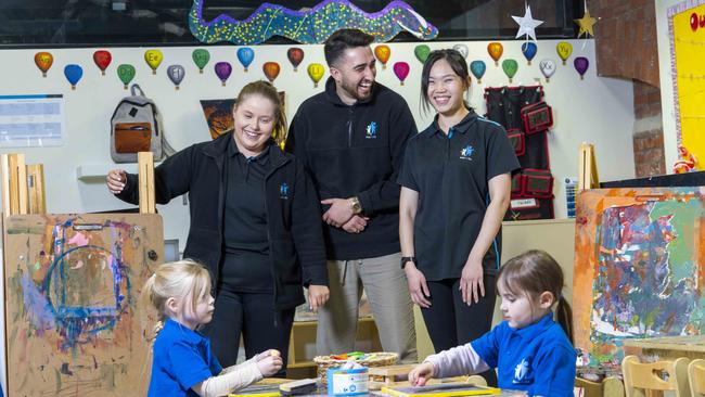 Kids and Co childcare workers Emma Dimarco, Tari Klisaris and Sherry Gan with Kiera and Violet, both 4. Picture: Wayne Taylor