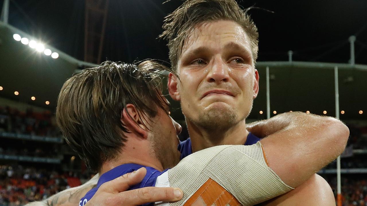 Caleb Daniel embraces Clay Smith after the preliminary final win in 2016.